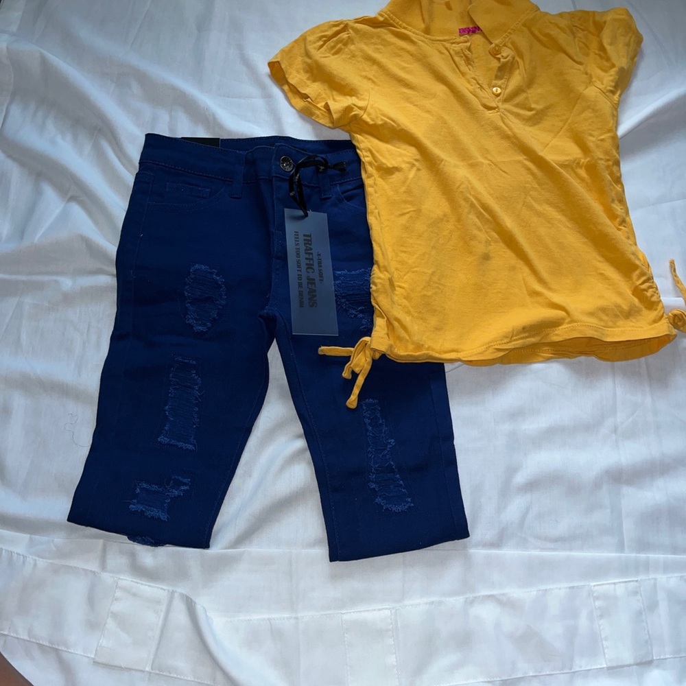 Grils Navy blue ripped jeans and yellow school uniform shirt